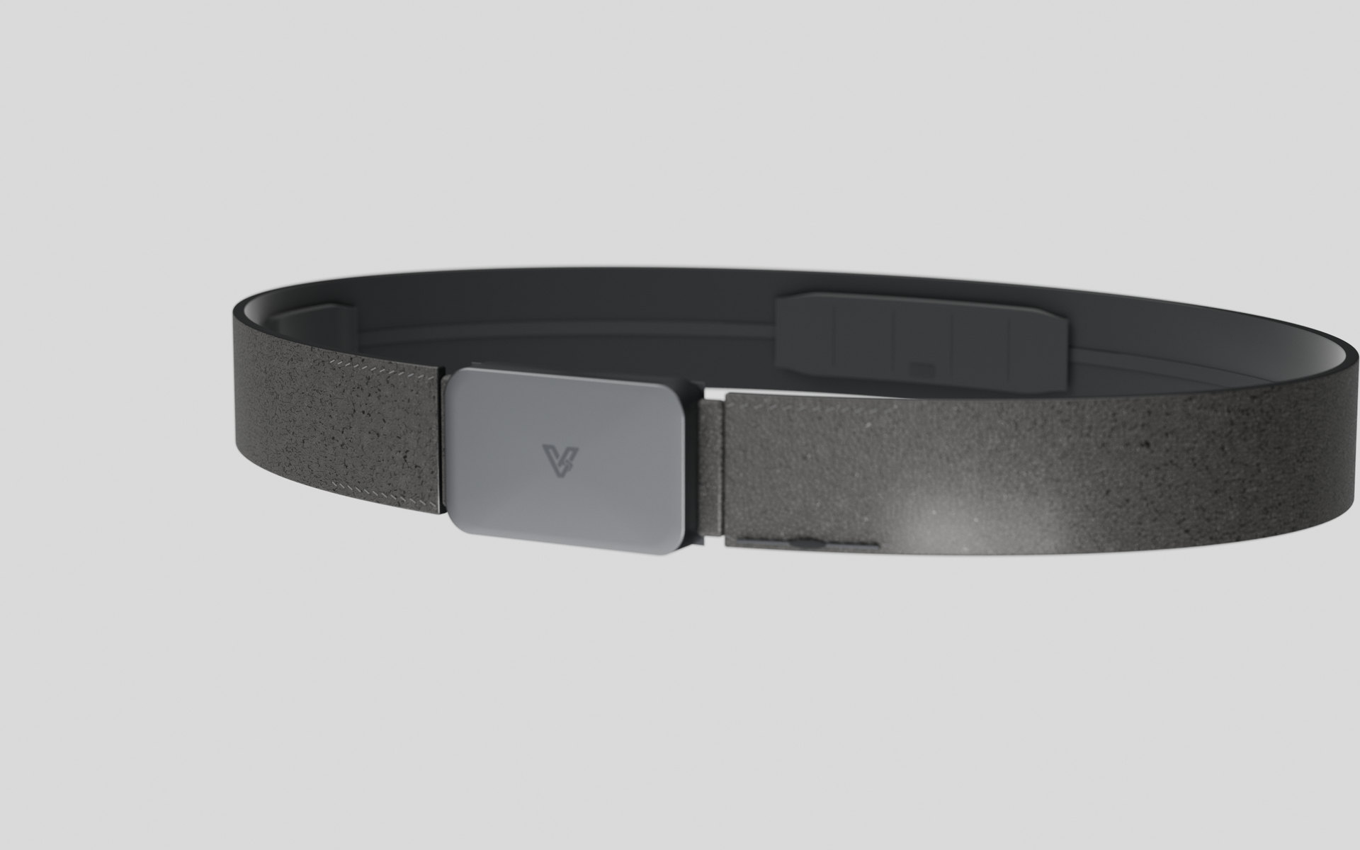 Front-right three-quarter view of the Vyldor belt, the side where the audio module is docked